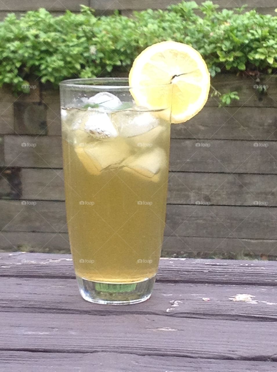 Enjoying a glass of green tea iced tea on a Spring day. 