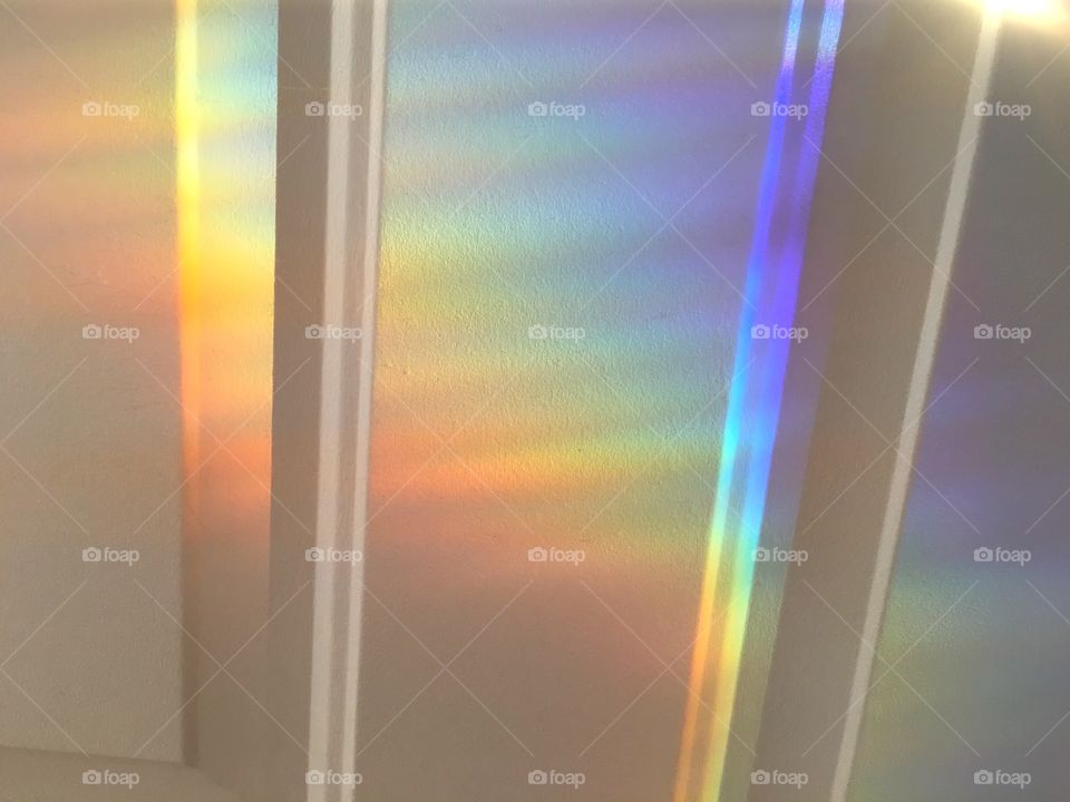 A full spectrum rainbow from sunlight on a crystal.