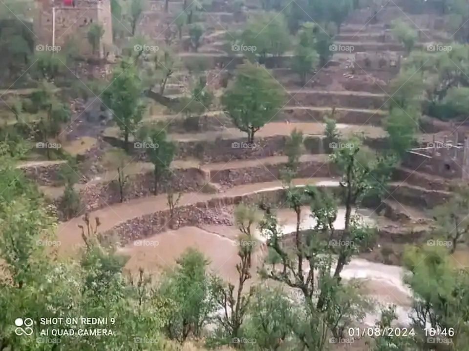 Glory be to God, the magnificent and picturesque view and the natural green trees are a view that is nothing more wonderful than it