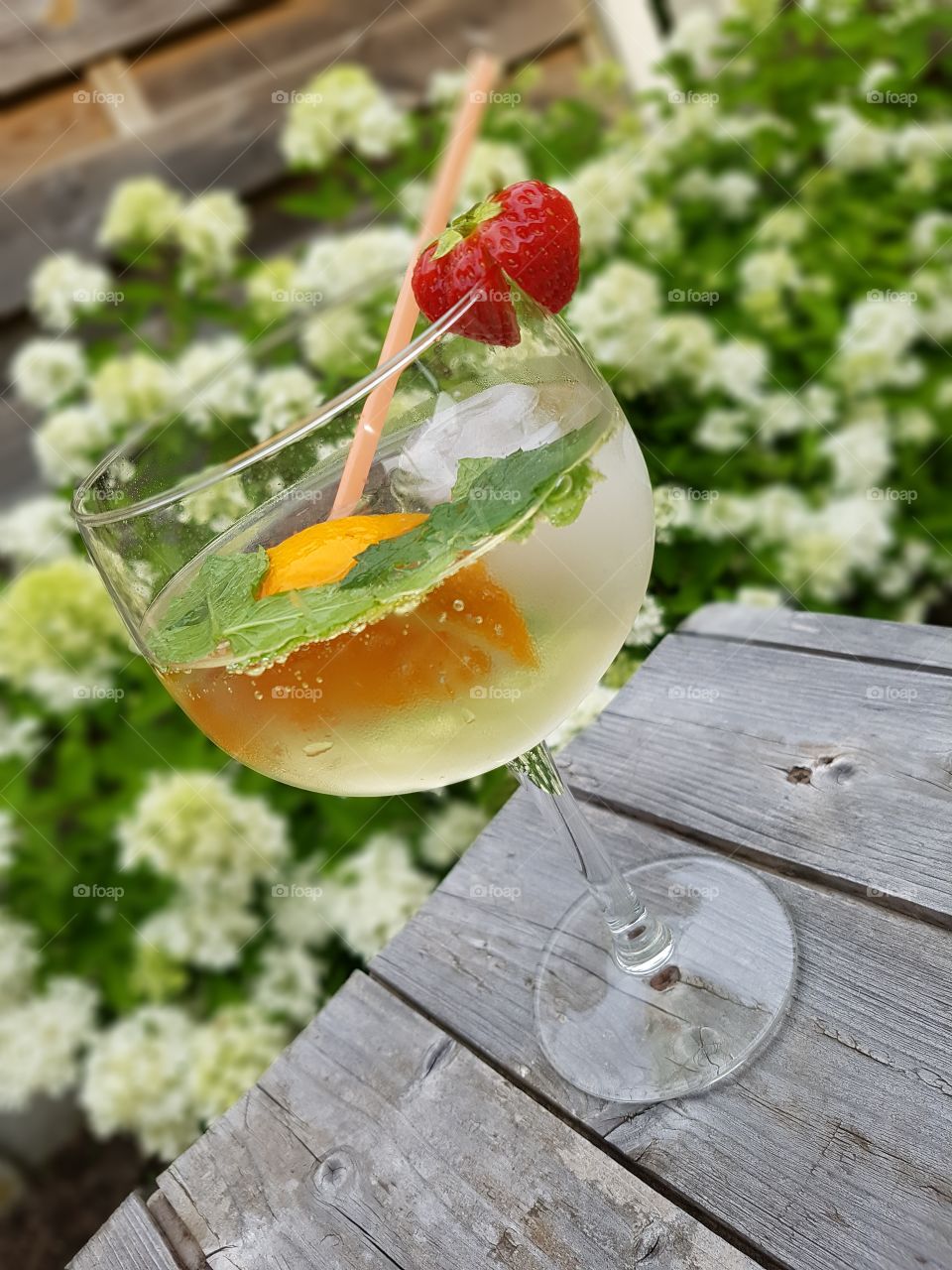 a lovely cocktail outdoors, enjoying life