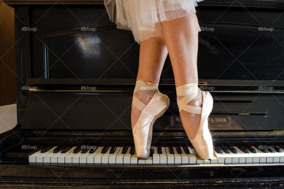 Ballerina Walking on A Piano