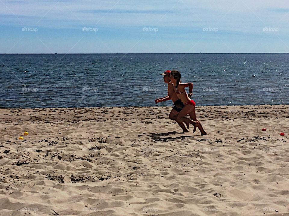 Children running on the beach! 