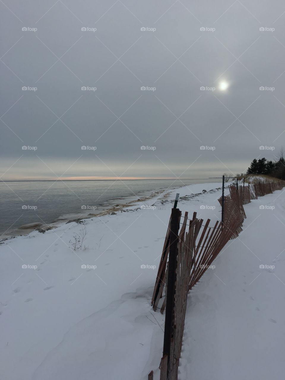 Snowy scene at the Tawas Point State Park in Tawas, Michigan 