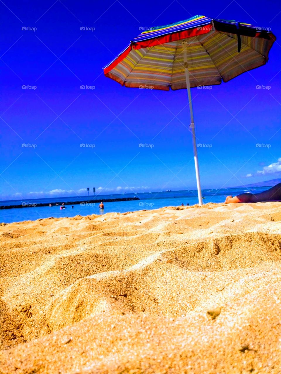 playing in the Sand on Wiakiki Beach