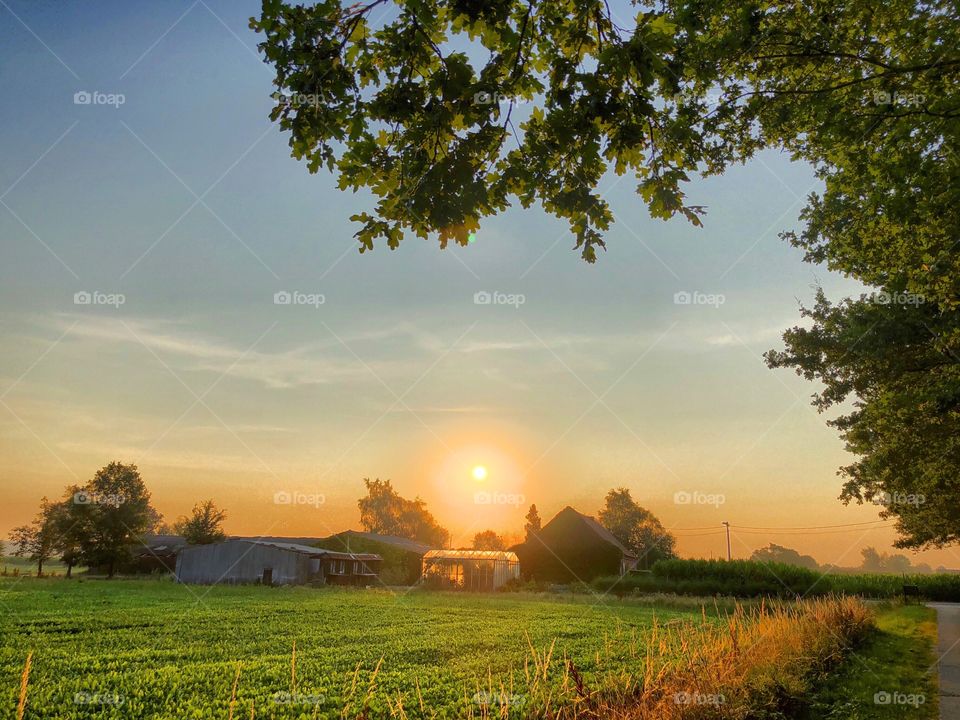 Sunrise or sunset over a Countryside landscape