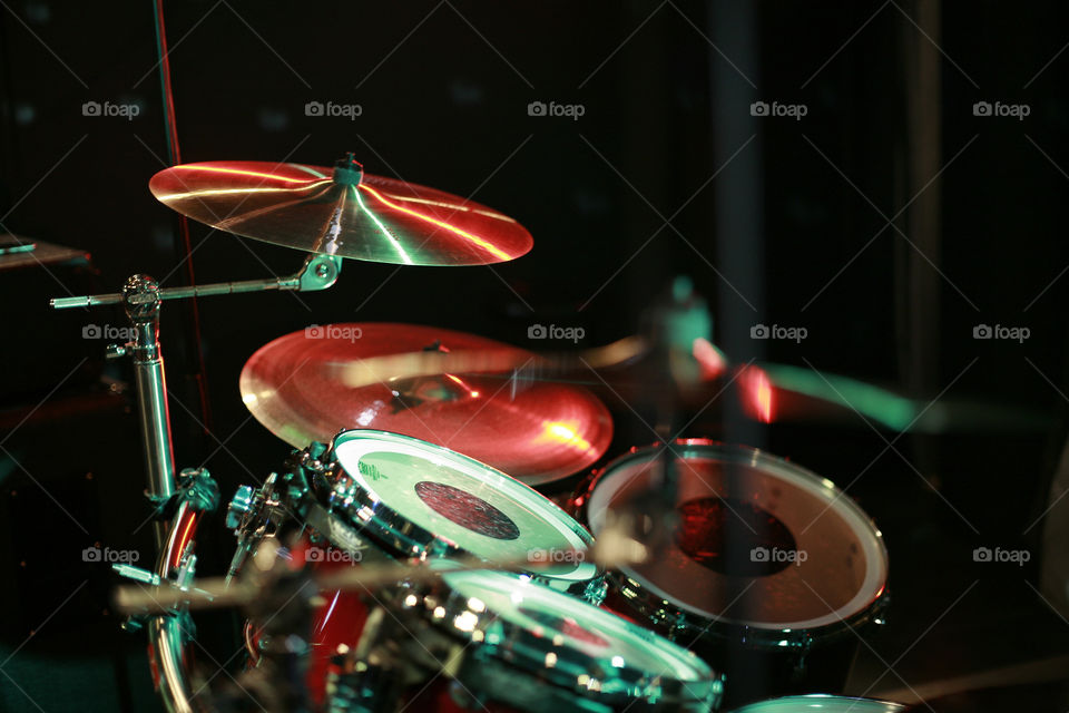 drums on black background. drum set and the club colors