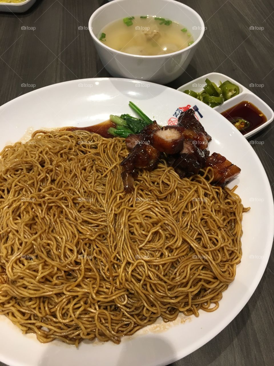 Wanton noodles and braised pork 