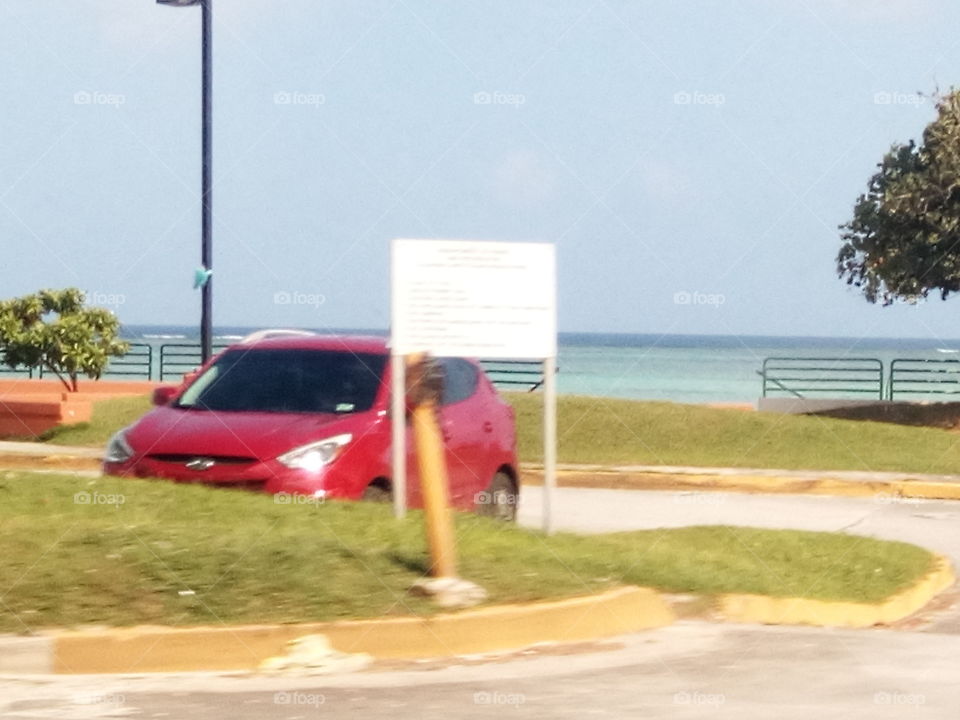 car next to the beach