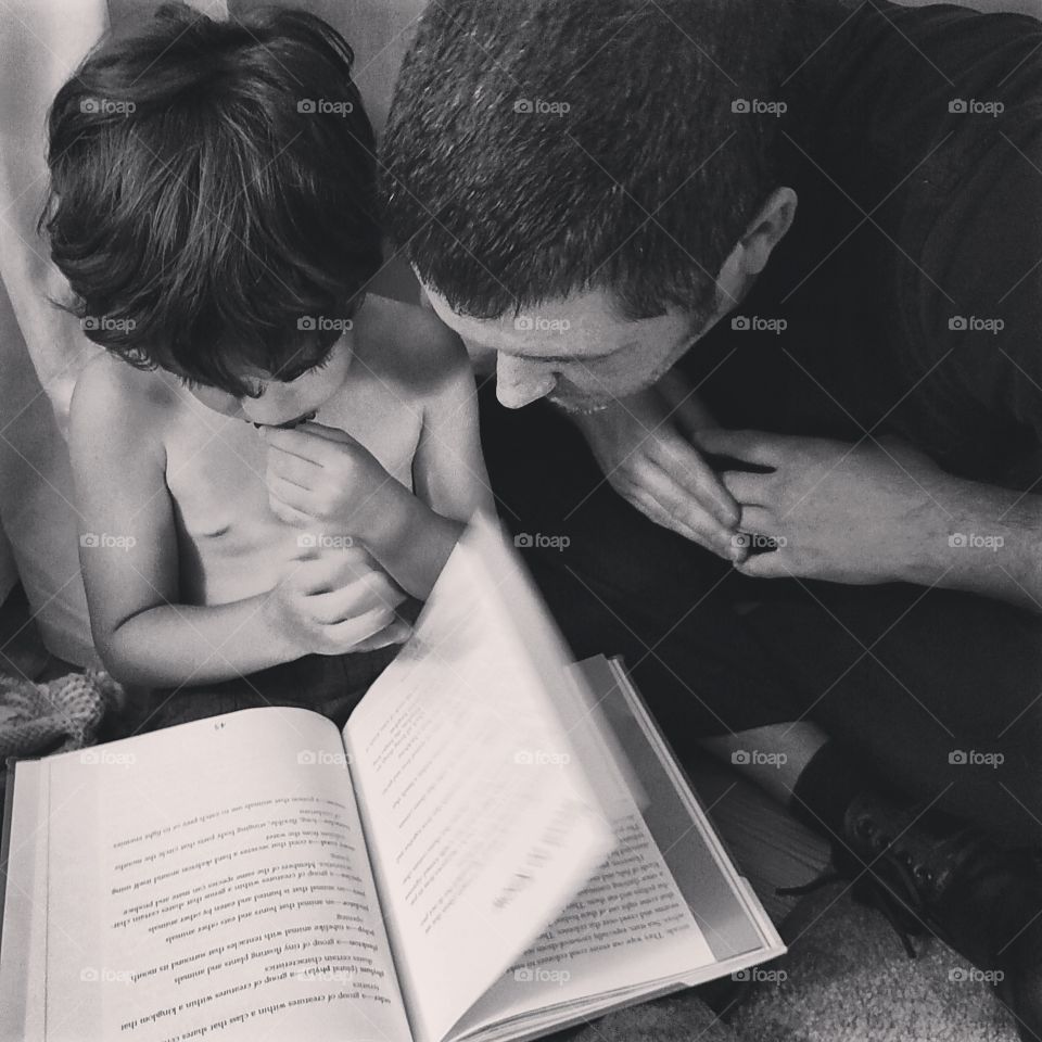 My Boys. father & son, reading up on corals and jellyfish