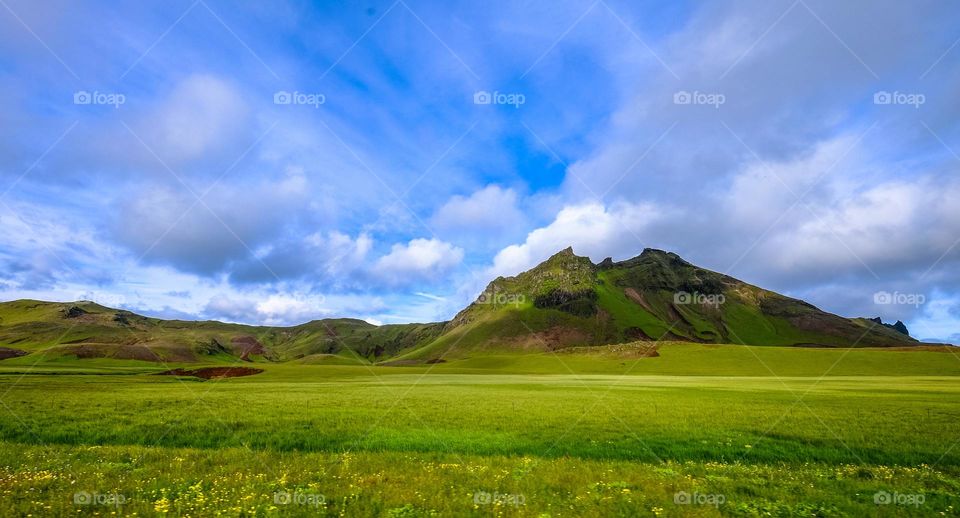 the green views and blue clouds