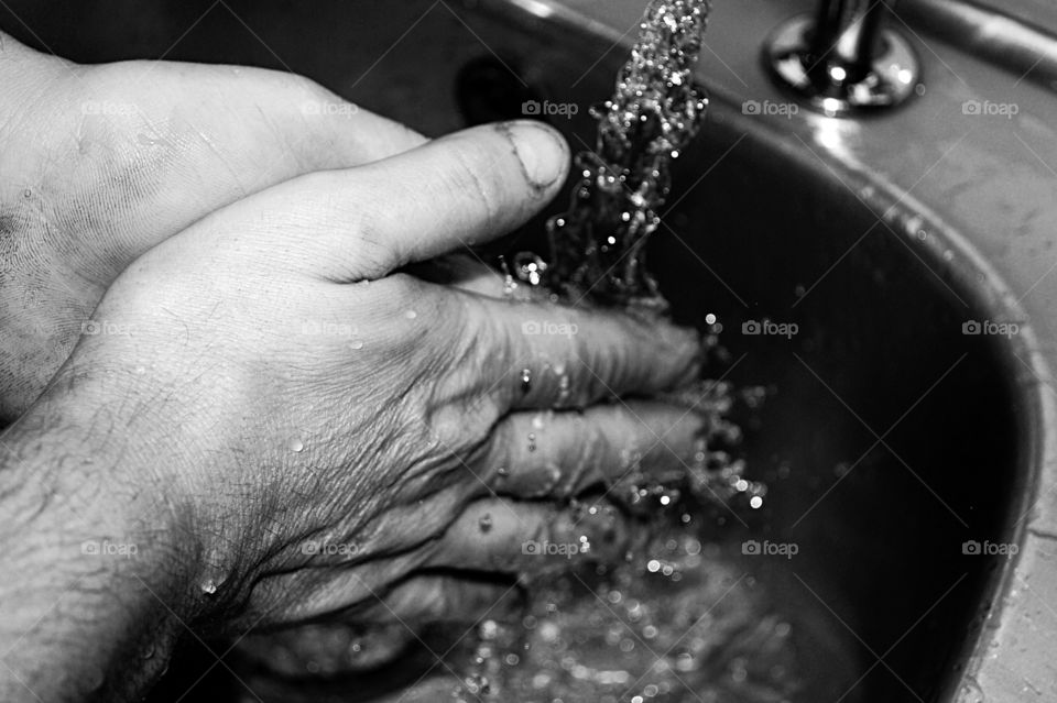 Worker washing hands