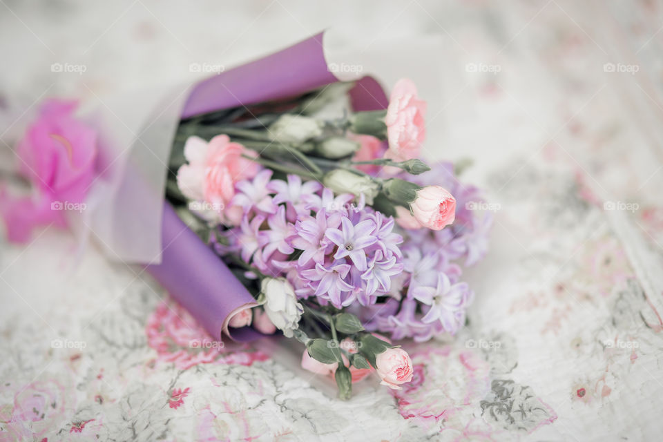 Spring bouquet in pink and purple colors 