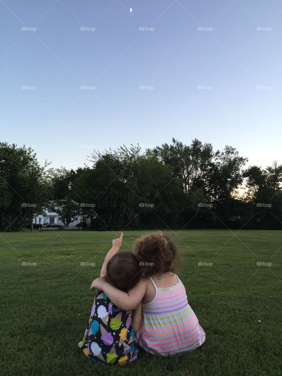 Look at the moon.... Sisterly love