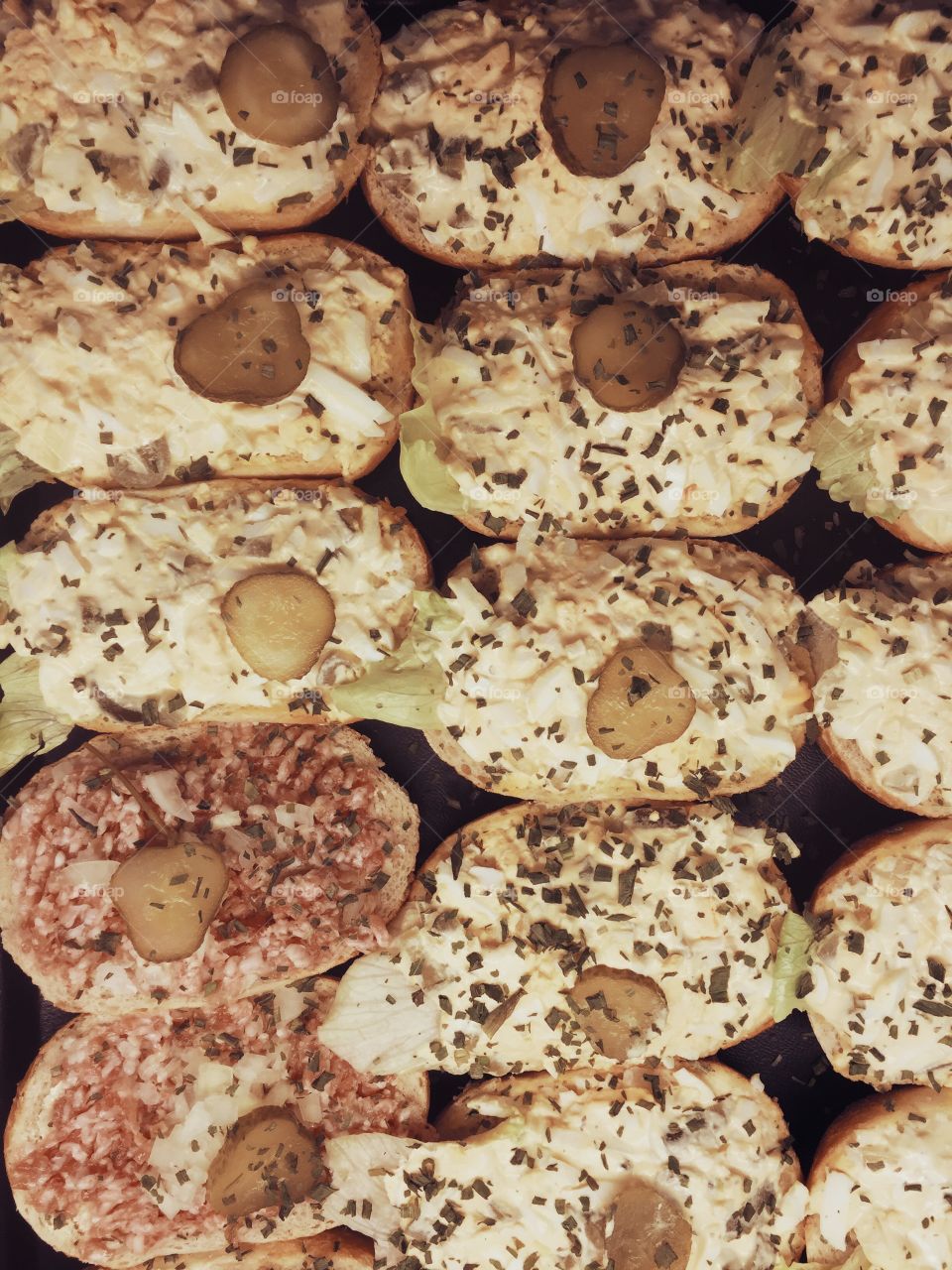 Bread rolls in bakery. Bread rolls with egg salad and minced meat