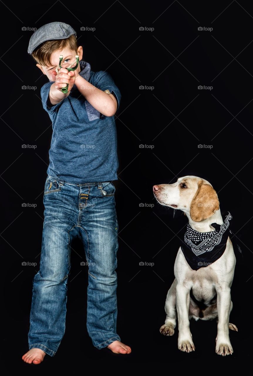 Naughty boy and his dog