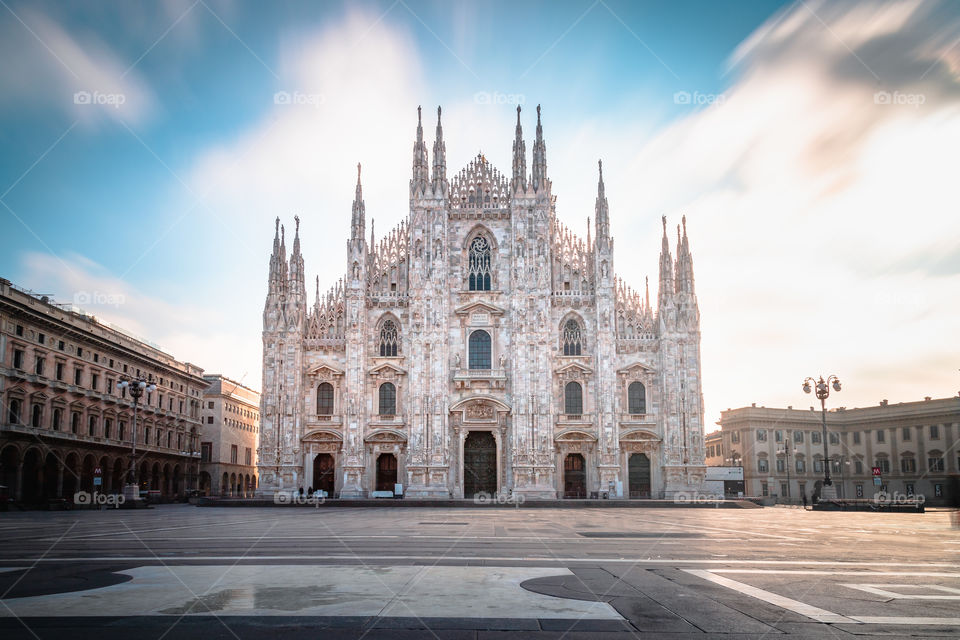 Long exposure of gothic cathedral of Milan (Duomo di Milano), blue sky with clouds