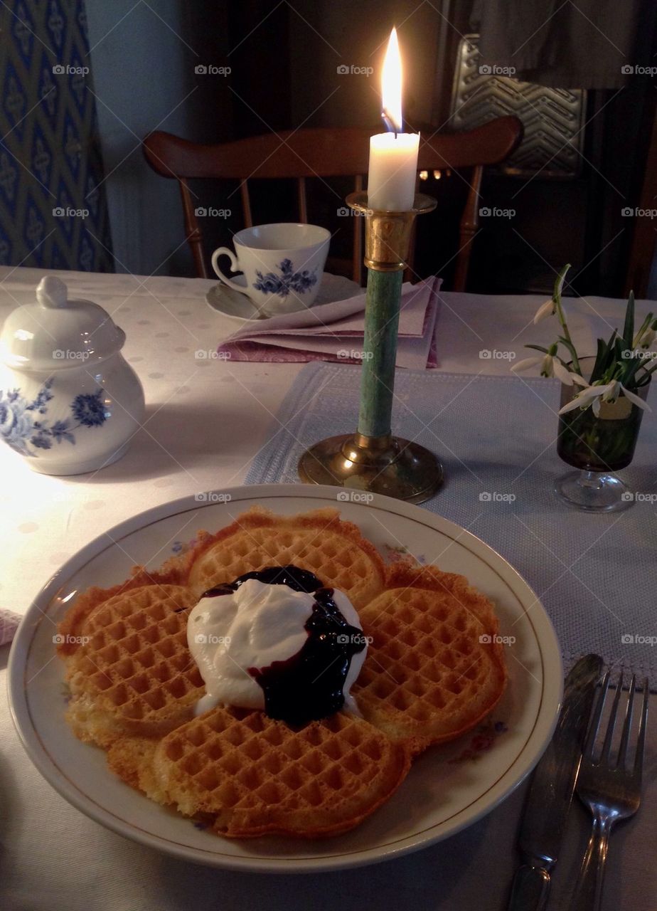 Waffle by the candle.