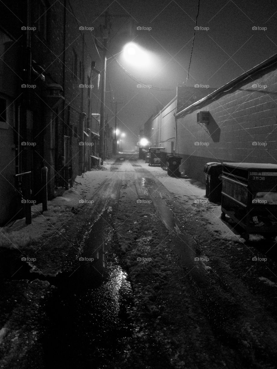 Lonely street in winter at night