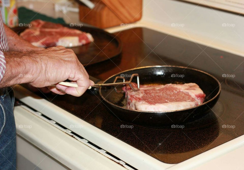 Searing the outside to keep the juices in.