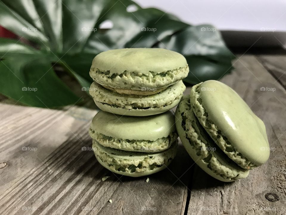 Macaroons on wooden table