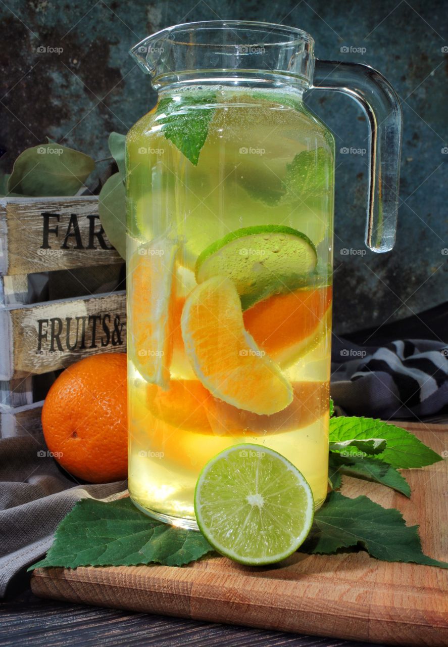 Fresh lemonade with orange lemon and lime 