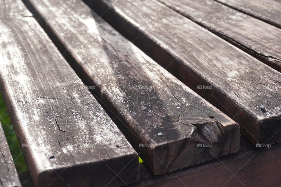Worn wood texture of a garden bench