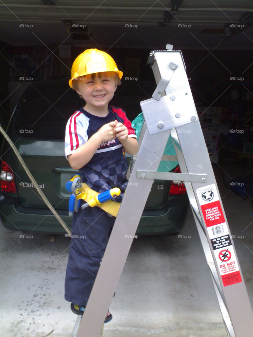 child hardhat ladder smile by kshapley