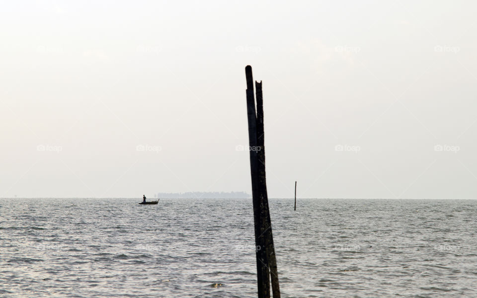 Distant view of ship at sea