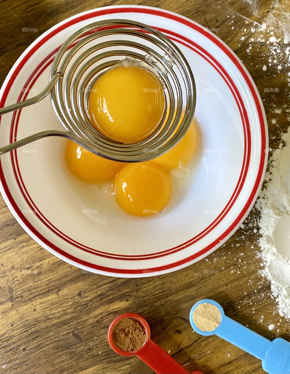 Circles, baking ingredients, eggs in a bowl