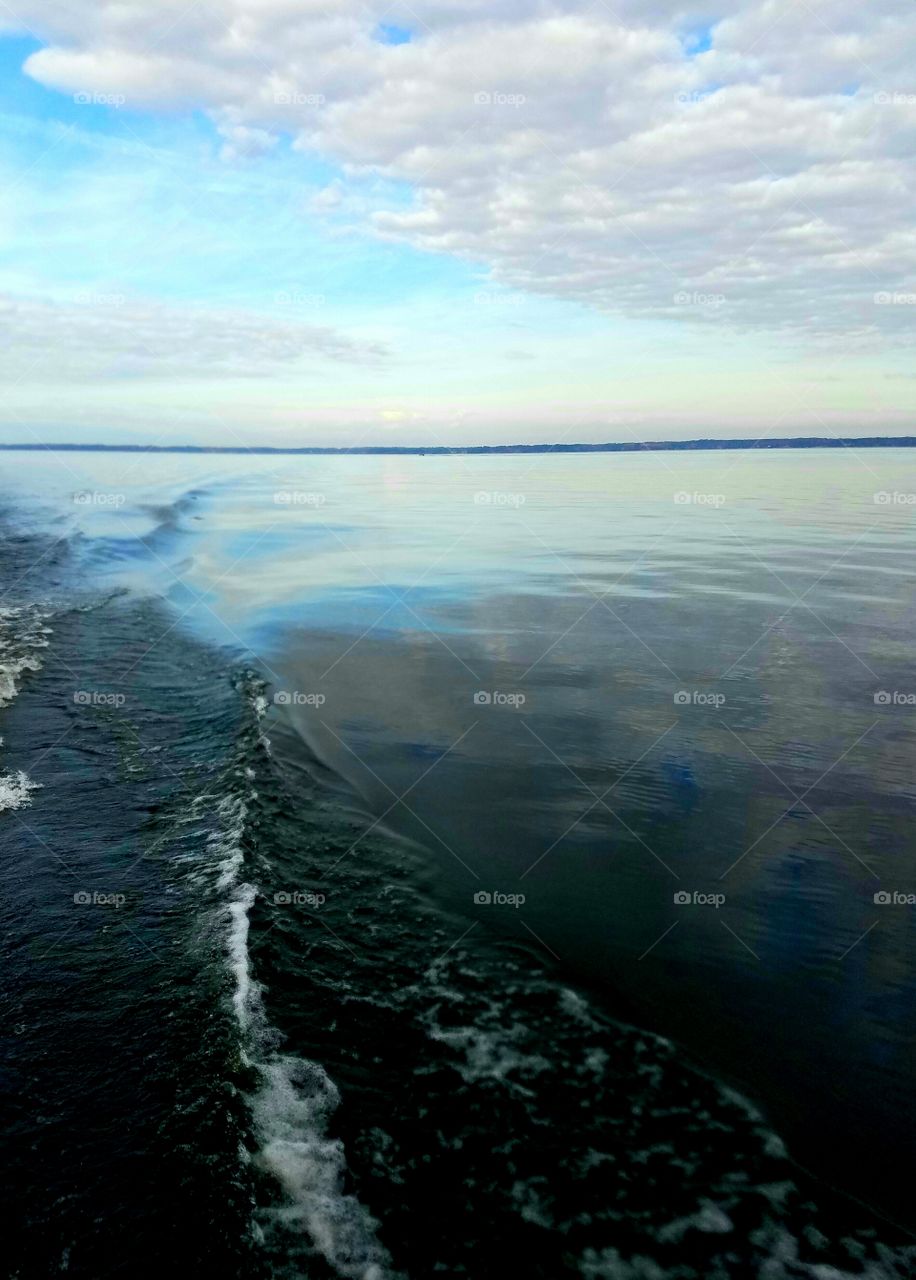 wake from boat on lake