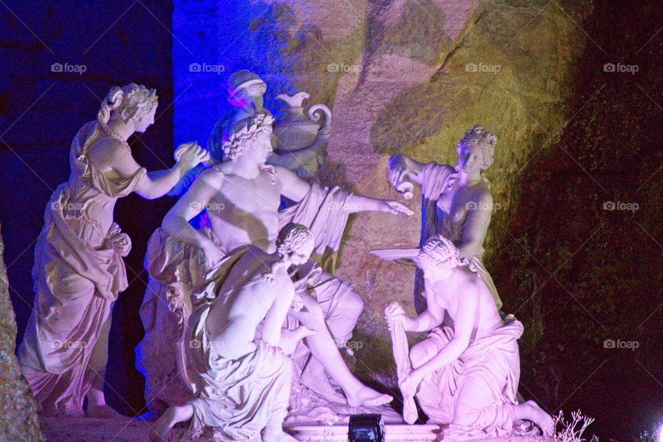 statue of a person in a garden