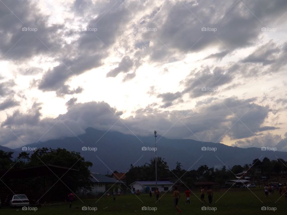 Playing football in the shadow of mount Kinabalu 