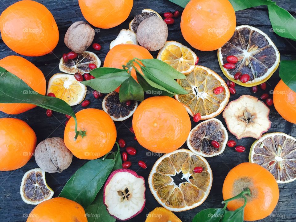 Tangerine fruit with walnut and apple