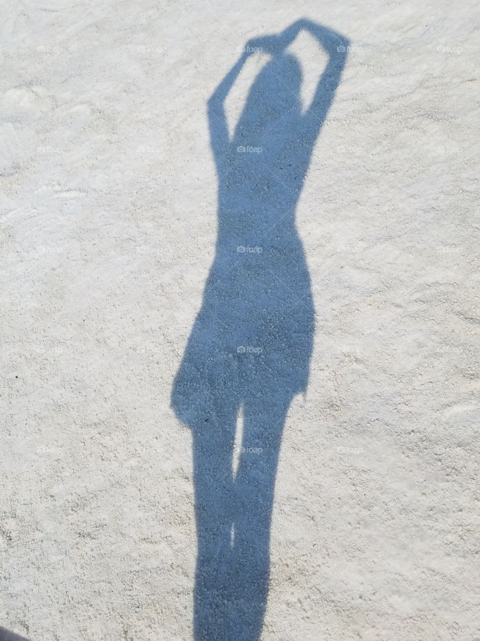 woman heart siholette in the salt lake of Sereflikochisar Turkey