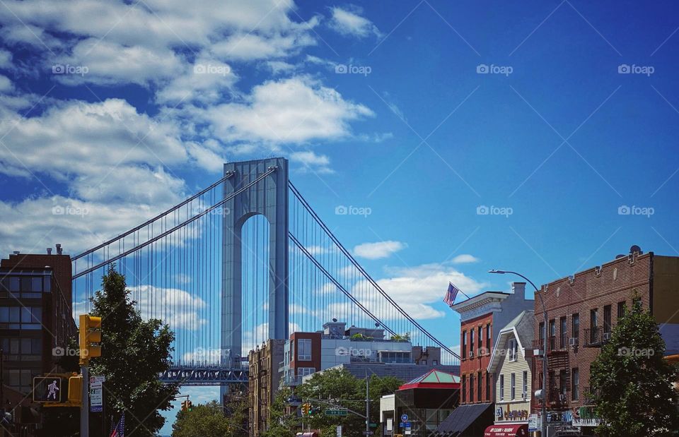 Verrazano-Narrows Bridge looming over the Bay Ridge, Brooklyn neighborhood 
