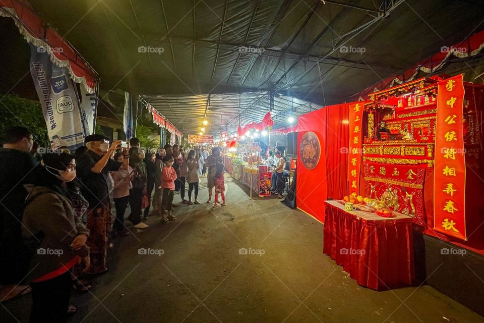 Watching Potehi Puppet Show at Lunar New Year Festival