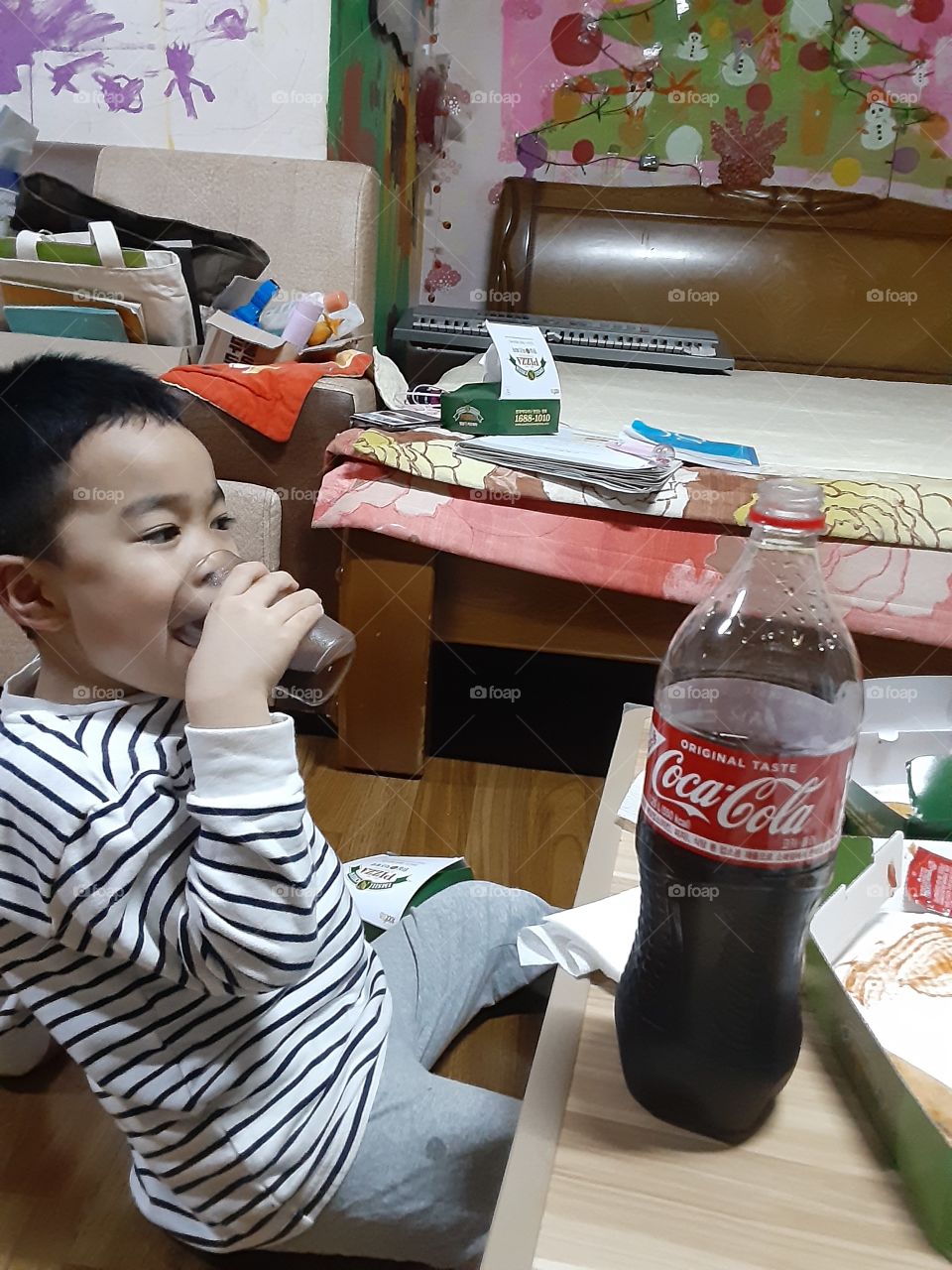 watching tv with coca cola