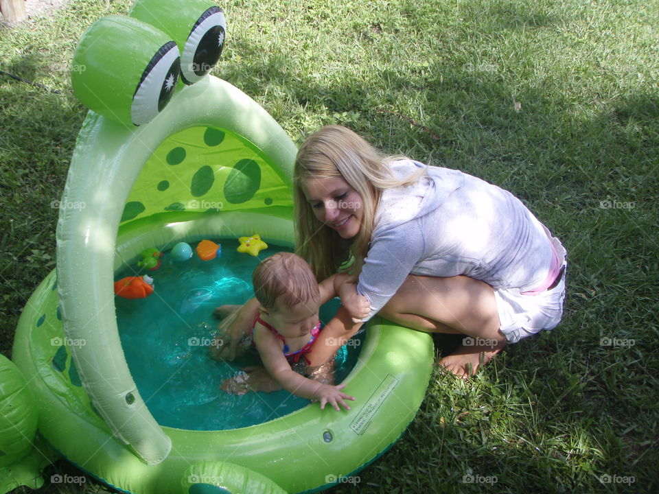 Baby's first time in a pool!