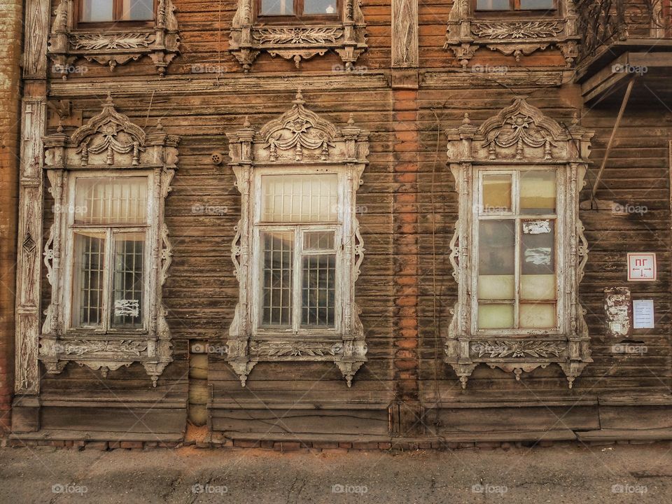 Old windows. . These windows have seen a lot. I wonder if how much longer that building will stay there. Barnaul, Russia. 