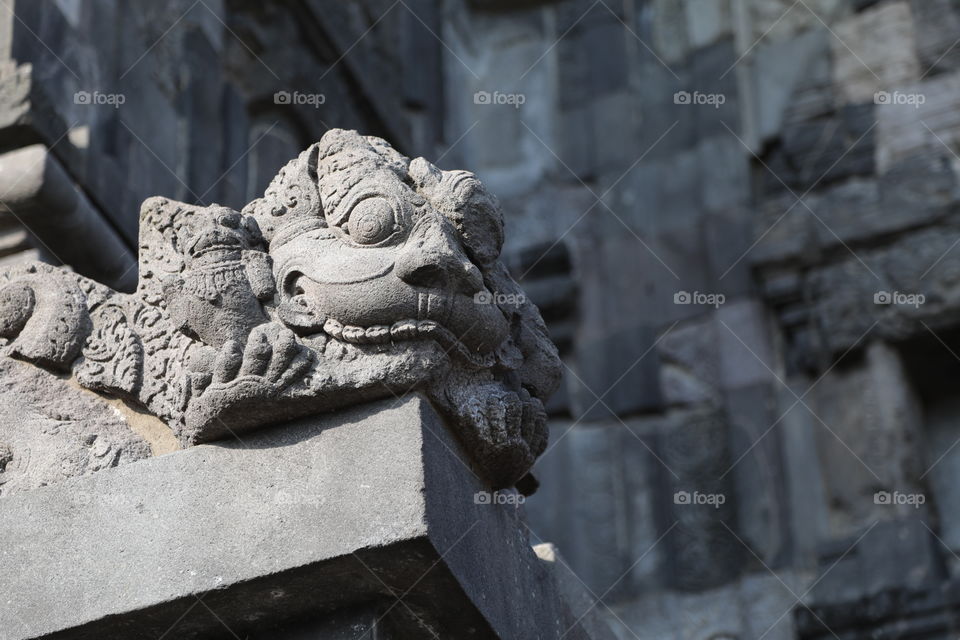 Detail of a lion carving at the Hindu temple of Prambanan near Jogyakarta, Indonesia, a UNESCO world heritage site.