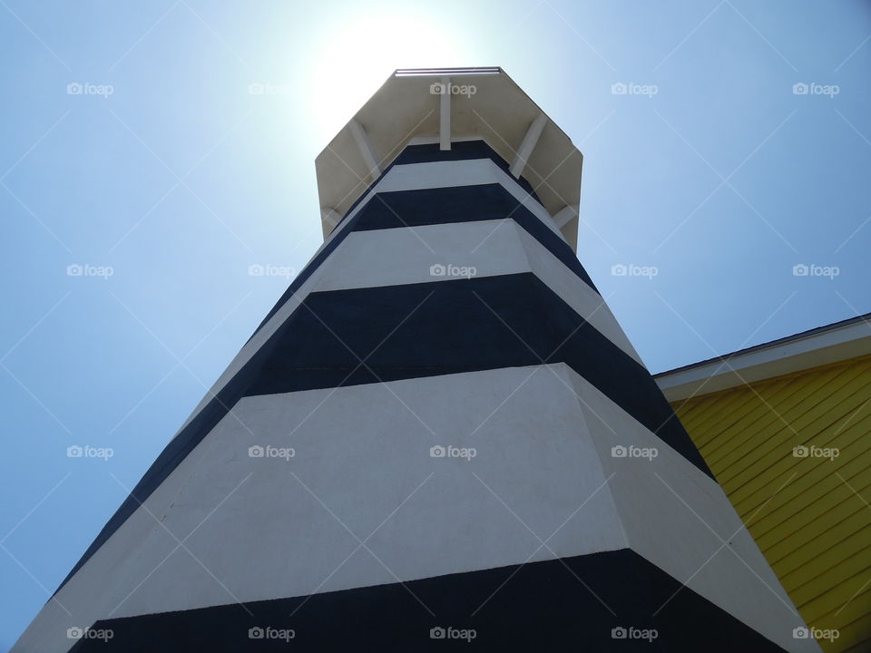 light house. This is a picture of a light house in Port Aransas Texas. I took this picture while on vacation in the Gulf of Mexico
