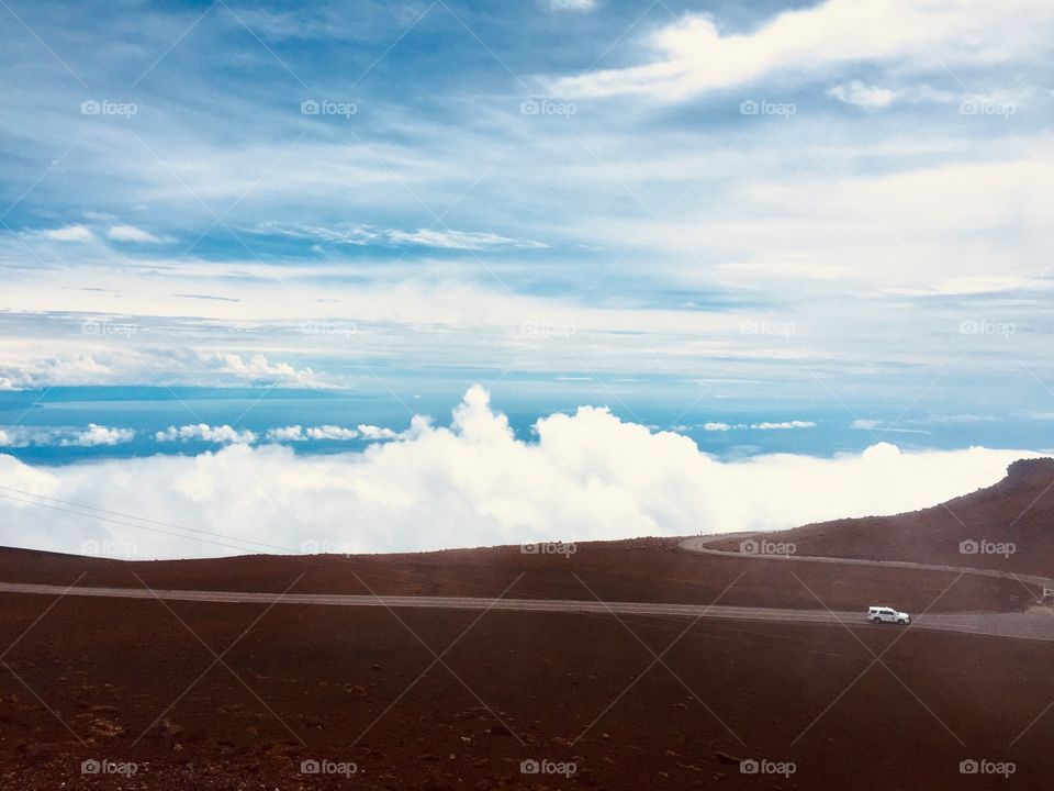 Top of the volcano above the clouds 