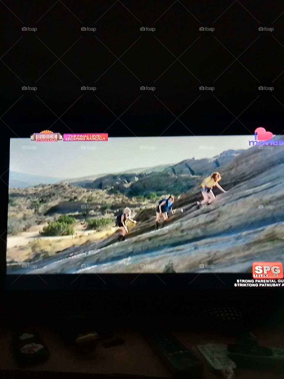 WATCHING MOVIE, THE FINAL LEVEL, ESCAPING RANCALA,, THE LEADING LADIES ARE ON MOUNTAIN CLIMBING ONB THEIR MISSION TO RESCUE JAKE