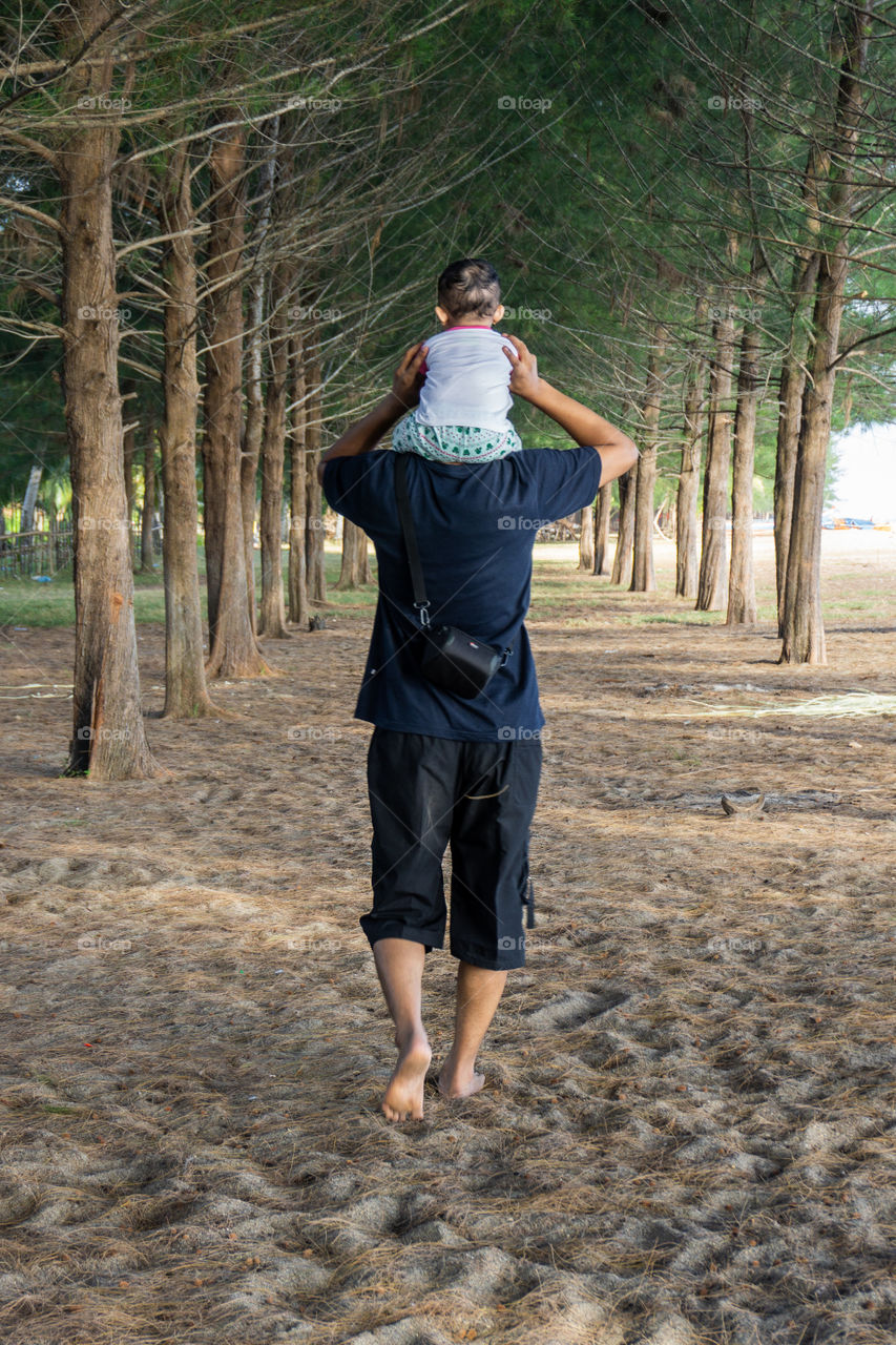 me and father walking on the beach