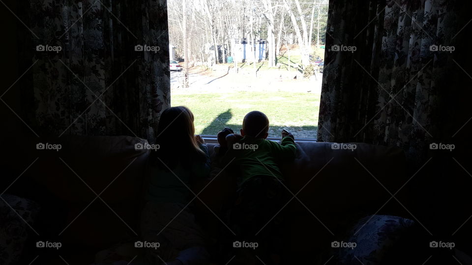 Kids Looking out window