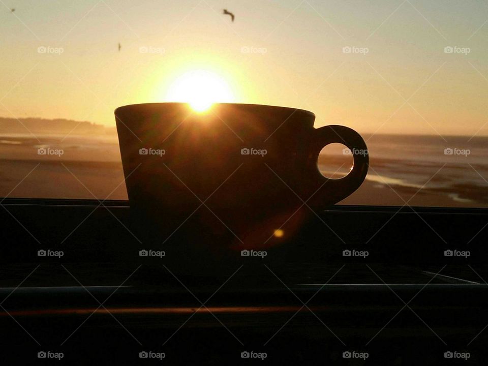 Beautiful cup of coffee towards sunset at essaouira city in Morocco