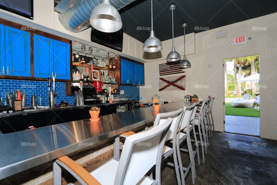 Bar Table inside restaurant at night with nobody 