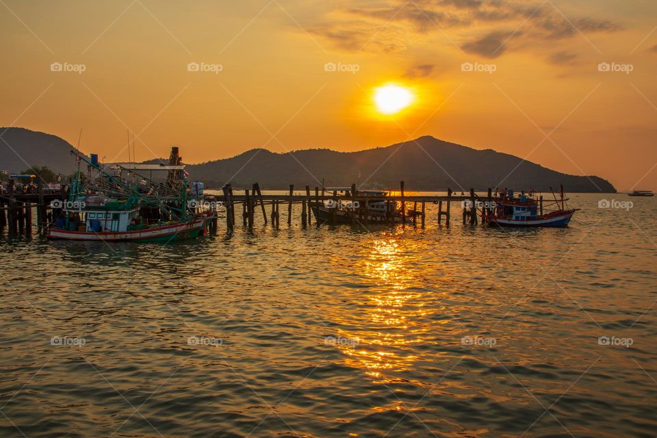 Thai Fisherman's Boats at a Fishing Pier in Bangsaray District Chonburi Thailand Southeast Asia during the Sunset Timeline