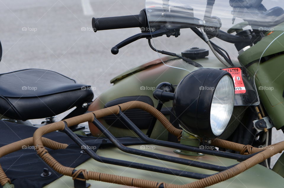 motorcycle vintage World War II Style with sidecar and olive drab paint job