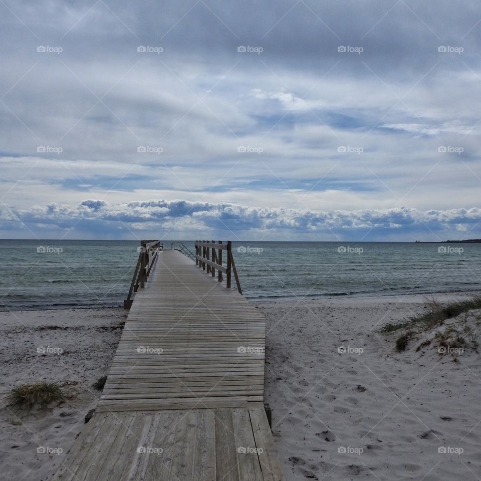 Jetty in clouds